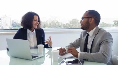 Man and woman discussing goals regarding careers. Career Coaching Services in Bonita Springs by Awakened Counseling Services.